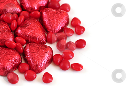 To use this stock image in your creative project, please select the size you need over to the right and click the "Add to Cart" button.
Your downloaded image will come with the Cutcaster watermark removed so don’t worry about the watermark you see on this page. Valentine candy stock photo, Red Valentine's candies and foil wrapped chocolates on white background by Elena Elisseeva