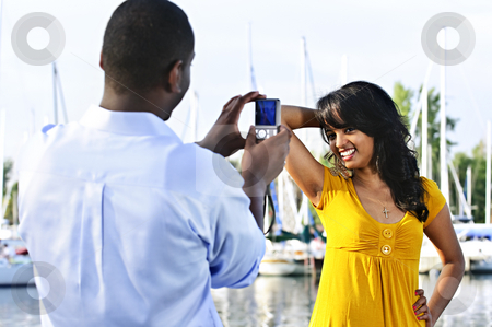 To use this stock image in your creative project, please select the size you need over to the right and click the "Add to Cart" button.
Your downloaded image will come with the Cutcaster watermark removed so don’t worry about the watermark you see on this page. Woman posing for picture near boats stock photo, Beautiful woman posing for vacation photo at harbor by Elena Elisseeva