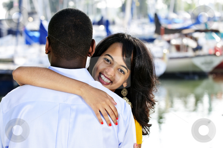 To use this stock image in your creative project, please select the size you need over to the right and click the "Add to Cart" button.
Your downloaded image will come with the Cutcaster watermark removed so don’t worry about the watermark you see on this page. Happy woman hugging man stock photo, Beautiful young woman hugging boyfriend standing at harbor by Elena Elisseeva