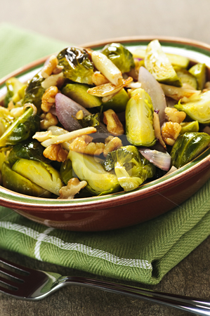 To use this stock image in your creative project, please select the size you need over to the right and click the "Add to Cart" button.
Your downloaded image will come with the Cutcaster watermark removed so don’t worry about the watermark you see on this page. Roasted brussels sprouts dish stock photo, Vegetarian bowl of roasted brussels sprouts with walnuts by Elena Elisseeva