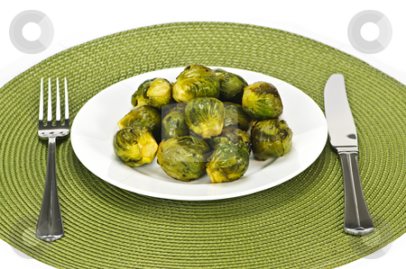 To use this stock image in your creative project, please select the size you need over to the right and click the "Add to Cart" button.
Your downloaded image will come with the Cutcaster watermark removed so don’t worry about the watermark you see on this page. Plate of brussels sprouts stock photo, Plate of green brussels sprouts with knife and fork by Elena Elisseeva