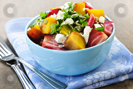 To use this stock image in your creative project, please select the size you need over to the right and click the "Add to Cart" button.
Your downloaded image will come with the Cutcaster watermark removed so don’t worry about the watermark you see on this page. Roasted red and golden beets stock photo, Bowl of roasted sliced red and golden beets by Elena Elisseeva