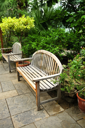 To use this stock image in your creative project, please select the size you need over to the right and click the "Add to Cart" button.
Your downloaded image will come with the Cutcaster watermark removed so don’t worry about the watermark you see on this page. Lush green garden stock photo, Lush green garden with stone landscaping and benches by Elena Elisseeva