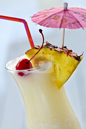 To use this stock image in your creative project, please select the size you need over to the right and click the "Add to Cart" button.
Your downloaded image will come with the Cutcaster watermark removed so don’t worry about the watermark you see on this page. Pina colada cocktail stock photo, Pina colada drink in hurricane cocktail glass isolated on white background by Elena Elisseeva