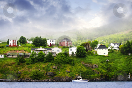 To use this stock image in your creative project, please select the size you need over to the right and click the "Add to Cart" button.
Your downloaded image will come with the Cutcaster watermark removed so don’t worry about the watermark you see on this page. Fishing village in Newfoundland stock photo, Quaint seaside fishing village in Newfoundland Canada by Elena Elisseeva
