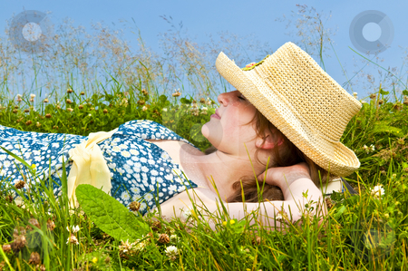 To use this stock image in your creative project, please select the size you need over to the right and click the "Add to Cart" button.
Your downloaded image will come with the Cutcaster watermark removed so don’t worry about the watermark you see on this page. Young girl resting in meadow stock photo, Young teenage girl resting on summer meadow in straw hat by Elena Elisseeva