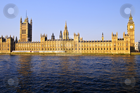 To use this stock image in your creative project, please select the size you need over to the right and click the "Add to Cart" button.
Your downloaded image will come with the Cutcaster watermark removed so don’t worry about the watermark you see on this page. Palace of Westminster with Big Ben stock photo, Houses of Parliament with Big Ben from Thames river by Elena Elisseeva