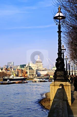 To use this stock image in your creative project, please select the size you need over to the right and click the "Add to Cart" button.
Your downloaded image will come with the Cutcaster watermark removed so don’t worry about the watermark you see on this page. London view from South Bank stock photo, View of St. Paul's Cathedral from South Bank of Thames river in London by Elena Elisseeva