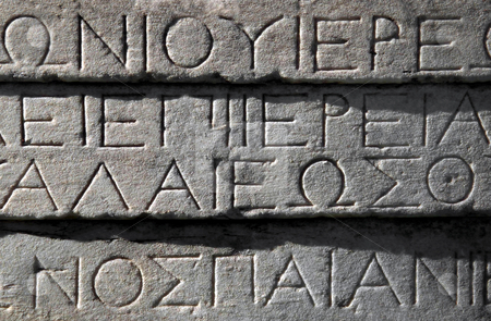 To use this stock image in your creative project, please select the size you need over to the right and click the "Add to Cart" button.
Your downloaded image will come with the Cutcaster watermark removed so don’t worry about the watermark you see on this page. Ancient Greek writing stock photo, Ancient Greek writing engraved on Parthenon building, Athens, Greece. by Martin Crowdy
