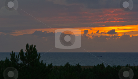 To use this stock image in your creative project, please select the size you need over to the right and click the "Add to Cart" button.
Your downloaded image will come with the Cutcaster watermark removed so don’t worry about the watermark you see on this page. Sonnenuntergang am Atlantik - Sunset on the Atlantic stock photo, by Wolfgang Heidasch