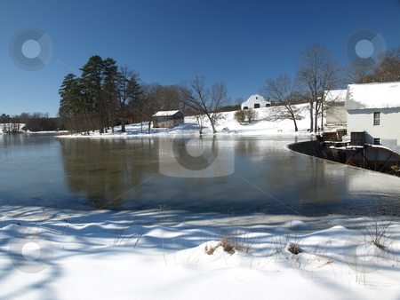 To use this stock image in your creative project, please select the size you need over to the right and click the "Add to Cart" button.
Your downloaded image will come with the Cutcaster watermark removed so don’t worry about the watermark you see on this page. Cold day at the mill stock photo, Cold day a a rural mill and pond by Tim Markley