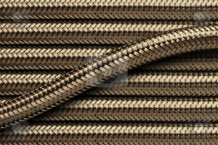 To use this stock image in your creative project, please select the size you need over to the right and click the "Add to Cart" button.
Your downloaded image will come with the Cutcaster watermark removed so don’t worry about the watermark you see on this page. Flexible stainless steel piping tubes stock photo, Flexible metallic stainless steel piping tubes by J.R. Bale