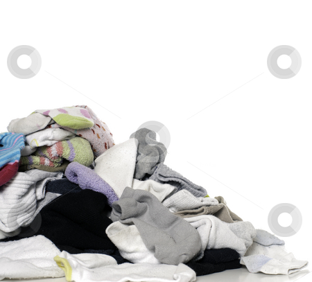 To use this stock image in your creative project, please select the size you need over to the right and click the "Add to Cart" button.
Your downloaded image will come with the Cutcaster watermark removed so don’t worry about the watermark you see on this page. Unsorted Laundry stock photo, A pile of clean unsorted laundry, isolated against a white background by Richard Nelson