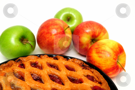 To use this stock image in your creative project, please select the size you need over to the right and click the "Add to Cart" button.
Your downloaded image will come with the Cutcaster watermark removed so don’t worry about the watermark you see on this page. Red And Green Apples And Pie stock photo, Fresh apple pie with red and green apples on a white background by Lynn Bendickson