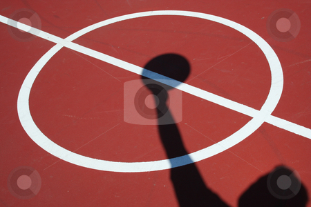 To use this stock image in your creative project, please select the size you need over to the right and click the "Add to Cart" button.
Your downloaded image will come with the Cutcaster watermark removed so don’t worry about the watermark you see on this page. Shadow Basketball player jump ball stock photo, A Shadow Basketball player jump ball on red court by Jim Mills