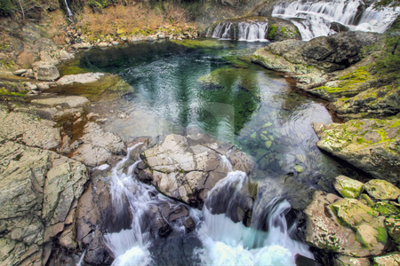 To use this stock image in your creative project, please select the size you need over to the right and click the "Add to Cart" button.
Your downloaded image will come with the Cutcaster watermark removed so don’t worry about the watermark you see on this page. Dougan Falls in Washington stock photo, Dougan Falls in Washington Scenic Columbia Gorge by Thye Gn