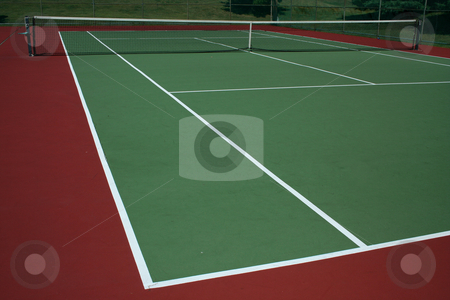 To use this stock image in your creative project, please select the size you need over to the right and click the "Add to Cart" button.
Your downloaded image will come with the Cutcaster watermark removed so don’t worry about the watermark you see on this page. Tennis Court stock photo, A empty green Tennis Court with net by Jim Mills