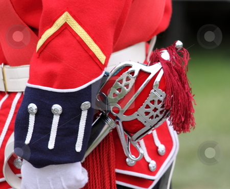 To use this stock image in your creative project, please select the size you need over to the right and click the "Add to Cart" button.
Your downloaded image will come with the Cutcaster watermark removed so don’t worry about the watermark you see on this page. English Uniforms stock photo, English uniforms at the with their bright colors by Henrik Lehnerer