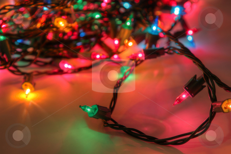 To use this stock image in your creative project, please select the size you need over to the right and click the "Add to Cart" button.
Your downloaded image will come with the Cutcaster watermark removed so don’t worry about the watermark you see on this page. Multi-Colored Light String stock photo, An HDR (high dynamic range) shot of a muli-colored Christmas light string. by Chris Hill