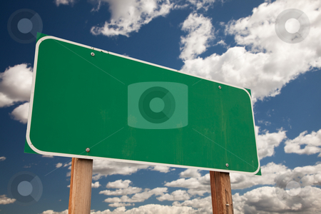 To use this stock image in your creative project, please select the size you need over to the right and click the "Add to Cart" button.
Your downloaded image will come with the Cutcaster watermark removed so don’t worry about the watermark you see on this page. Blank Green Road Sign Over Clouds stock photo, Blank Green Road Sign on Dramatic Blue Sky with Clouds - Ready for your own message. by Andy Dean