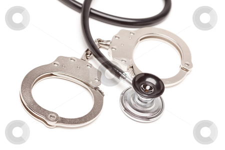 To use this stock image in your creative project, please select the size you need over to the right and click the "Add to Cart" button.
Your downloaded image will come with the Cutcaster watermark removed so don’t worry about the watermark you see on this page. Stethoscope and Handcuffs on White stock photo, Stethoscope and Handcuffs Isolated on a White Background. by Andy Dean