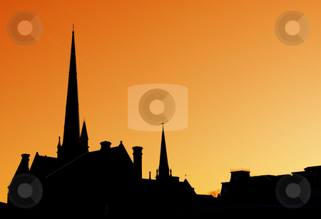 To use this stock image in your creative project, please select the size you need over to the right and click the "Add to Cart" button.
Your downloaded image will come with the Cutcaster watermark removed so don’t worry about the watermark you see on this page. Cathedral Spires stock photo, The spires of a cathedral against an orange sky. by Chris Hill