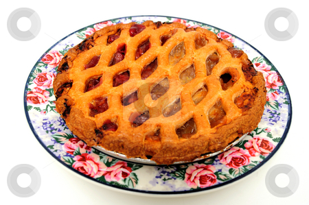 To use this stock image in your creative project, please select the size you need over to the right and click the "Add to Cart" button.
Your downloaded image will come with the Cutcaster watermark removed so don’t worry about the watermark you see on this page. Cherry And Apple Pie stock photo, Fresh apple pie with red and green apples on a white background by Lynn Bendickson
