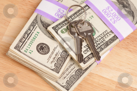 To use this stock image in your creative project, please select the size you need over to the right and click the "Add to Cart" button.
Your downloaded image will come with the Cutcaster watermark removed so don’t worry about the watermark you see on this page. House Keys on Stack of Money stock photo, House Keys on Stack of Money - Cash for Keys Program. by Andy Dean