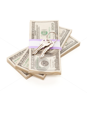 To use this stock image in your creative project, please select the size you need over to the right and click the "Add to Cart" button.
Your downloaded image will come with the Cutcaster watermark removed so don’t worry about the watermark you see on this page. House Keys on Stack of Money Isolated stock photo, House Keys on Stack of Money Isolated on a White Background - Cash for Keys Program. by Andy Dean