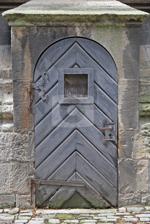 To use this stock image in your creative project, please select the size you need over to the right and click the "Add to Cart" button.
Your downloaded image will come with the Cutcaster watermark removed so don’t worry about the watermark you see on this page. Old church door. stock photo, Old church door with a window at level of eyes. by Nikolaj Kondratenko