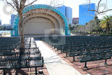To use this stock image in your creative project, please select the size you need over to the right and click the "Add to Cart" button.
Your downloaded image will come with the Cutcaster watermark removed so don’t worry about the watermark you see on this page. The Bandshell, Downtown Orlando, Florida stock photo, The bandshell at Lake Eola in downtown Orlando, Florida. by Carl Stewart