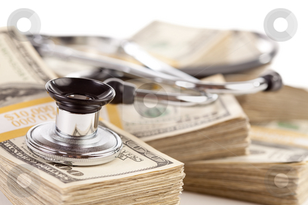 To use this stock image in your creative project, please select the size you need over to the right and click the "Add to Cart" button.
Your downloaded image will come with the Cutcaster watermark removed so don’t worry about the watermark you see on this page. Stethoscope Laying on Stacks of Money stock photo, Stethoscope Laying on Stacks of Hundred Dollar Bills with Narrow Depth of Field. by Andy Dean