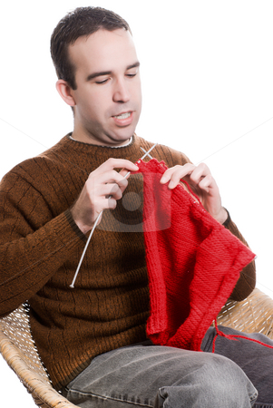 To use this stock image in your creative project, please select the size you need over to the right and click the "Add to Cart" button.
Your downloaded image will come with the Cutcaster watermark removed so don’t worry about the watermark you see on this page. Knitting Man stock photo, A young man knitting a red cloth, isolated against a white background by Richard Nelson