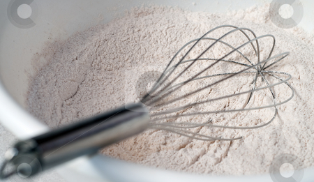 To use this stock image in your creative project, please select the size you need over to the right and click the "Add to Cart" button.
Your downloaded image will come with the Cutcaster watermark removed so don’t worry about the watermark you see on this page. Muffin Mix stock photo, Dried muffin mix with a whisk about to mix it up by Richard Nelson