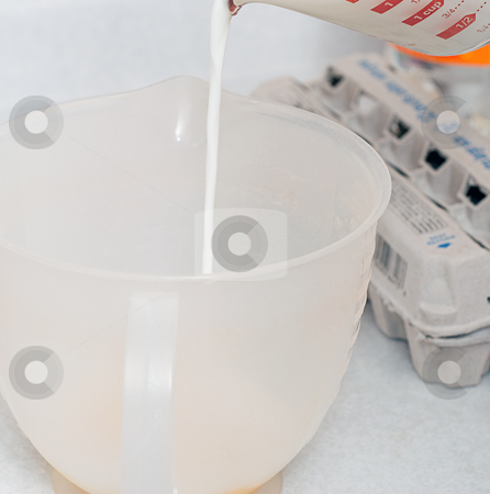 To use this stock image in your creative project, please select the size you need over to the right and click the "Add to Cart" button.
Your downloaded image will come with the Cutcaster watermark removed so don’t worry about the watermark you see on this page. Measuring Milk stock photo, Milk is being measured in a plastic measuring cup by Richard Nelson