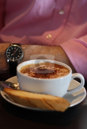 To use this stock image in your creative project, please select the size you need over to the right and click the "Add to Cart" button.
Your downloaded image will come with the Cutcaster watermark removed so don’t worry about the watermark you see on this page. Coffee Time stock photo, Cup of cappuccino/coffee with man in pink business shirt and watch by Keri Bevan
