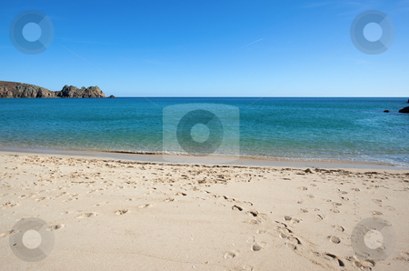 To use this stock image in your creative project, please select the size you need over to the right and click the "Add to Cart" button.
Your downloaded image will come with the Cutcaster watermark removed so don’t worry about the watermark you see on this page. Porthcurno sandy beach and Logan rock in Cornwall UK. stock photo, Porthcurno sandy beach and Logan rock in Cornwall UK. by Stephen Rees