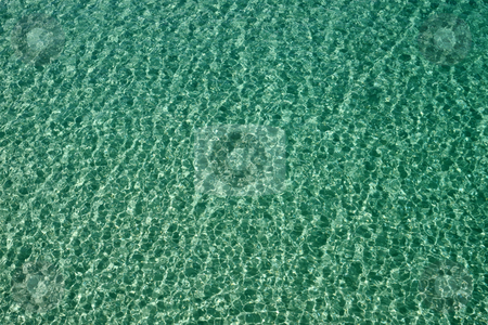 To use this stock image in your creative project, please select the size you need over to the right and click the "Add to Cart" button.
Your downloaded image will come with the Cutcaster watermark removed so don’t worry about the watermark you see on this page. Clear turquoise shallow sea ripples close up. stock photo, Clear turquoise shallow sea ripples close up. by Stephen Rees
