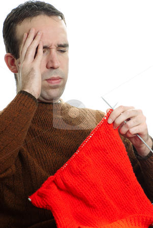 To use this stock image in your creative project, please select the size you need over to the right and click the "Add to Cart" button.
Your downloaded image will come with the Cutcaster watermark removed so don’t worry about the watermark you see on this page. Hobby Frustration stock photo, A young man is getting frustrated at his knitting, isolated against a white background by Richard Nelson