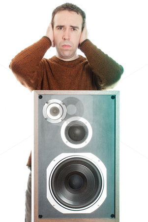 To use this stock image in your creative project, please select the size you need over to the right and click the "Add to Cart" button.
Your downloaded image will come with the Cutcaster watermark removed so don’t worry about the watermark you see on this page. Loud Music stock photo, A young man covering his ears in pain, because of the loud music, isolated against a white background by Richard Nelson