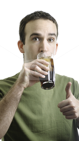 To use this stock image in your creative project, please select the size you need over to the right and click the "Add to Cart" button.
Your downloaded image will come with the Cutcaster watermark removed so don’t worry about the watermark you see on this page. Man Drinking Pop stock photo, A young man drinking a tall glass of pop and giving a thumbs up, isolated against a white background by Richard Nelson