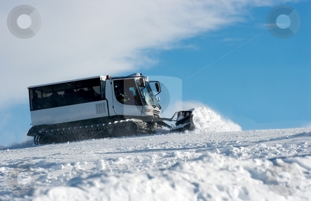 To use this stock image in your creative project, please select the size you need over to the right and click the "Add to Cart" button.
Your downloaded image will come with the Cutcaster watermark removed so don’t worry about the watermark you see on this page. Ski resort stock photo, Ski slope with a white ratrak doing track maintenance by P?