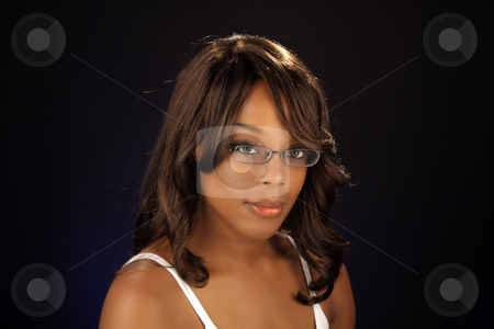 To use this stock image in your creative project, please select the size you need over to the right and click the "Add to Cart" button.
Your downloaded image will come with the Cutcaster watermark removed so don’t worry about the watermark you see on this page. Beautiful BlackWoman, Headshot (5) stock photo, An extraordinarily beautiful young black woman. by Carl Stewart
