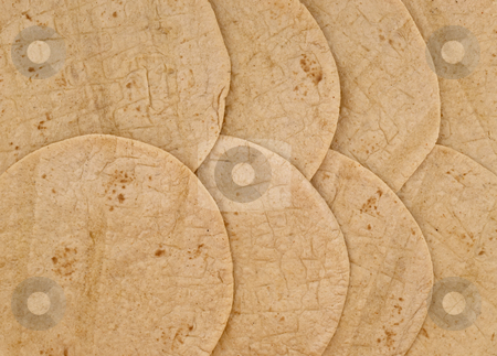 To use this stock image in your creative project, please select the size you need over to the right and click the "Add to Cart" button.
Your downloaded image will come with the Cutcaster watermark removed so don’t worry about the watermark you see on this page. Wheat tortilla background stock photo, Texture and pattern of overlapping wheat flour tortillas by Marek Uliasz