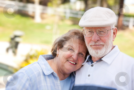 To use this stock image in your creative project, please select the size you need over to the right and click the "Add to Cart" button.
Your downloaded image will come with the Cutcaster watermark removed so don’t worry about the watermark you see on this page. Happy Senior Couple in The Park stock photo, Happy Senior Couple Enjoying Each Other in The Park. by Andy Dean