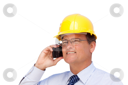 To use this stock image in your creative project, please select the size you need over to the right and click the "Add to Cart" button.
Your downloaded image will come with the Cutcaster watermark removed so don’t worry about the watermark you see on this page. Contractor in Hardhat on His Cell Phone Isoalted stock photo, Handsome Contractor in Hardhat and Necktie Smiles as He Talks on His Cell Phone Isolated on a White Background. by Andy Dean