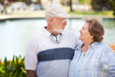 To use this stock image in your creative project, please select the size you need over to the right and click the "Add to Cart" button.
Your downloaded image will come with the Cutcaster watermark removed so don’t worry about the watermark you see on this page. Happy Senior Couple in The Park stock photo, Happy Senior Couple Enjoying Each Other in The Park. by Andy Dean