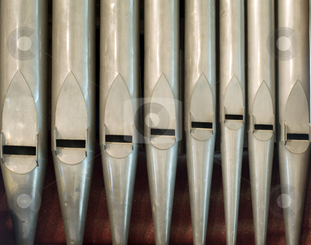 To use this stock image in your creative project, please select the size you need over to the right and click the "Add to Cart" button.
Your downloaded image will come with the Cutcaster watermark removed so don’t worry about the watermark you see on this page. Old organ pipes stock photo, A row of organ pipes on an old church organ by Stephen Gibson