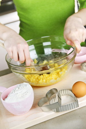 To use this stock image in your creative project, please select the size you need over to the right and click the "Add to Cart" button.
Your downloaded image will come with the Cutcaster watermark removed so don’t worry about the watermark you see on this page. Baking cookies stock photo, Mixing ingredients for baking cookies in glass bowl by Elena Elisseeva