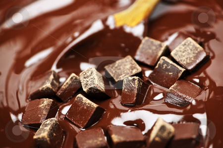 To use this stock image in your creative project, please select the size you need over to the right and click the "Add to Cart" button.
Your downloaded image will come with the Cutcaster watermark removed so don’t worry about the watermark you see on this page. Melting chocolate and spoon stock photo, Wooden spoon stirring melting rich chocolate chunks by Elena Elisseeva